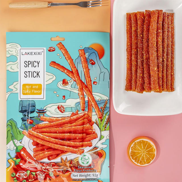 Close-up of Traditional Hot and Spicy Stick texture - chewy strip grain snack, Hot Spicy flavor, vacuum-packed