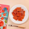	Close-up of Traditional Sweet Spicy Chunk texture - thick chewy grain snack, Sweet Spicy flavor, vacuum-packed